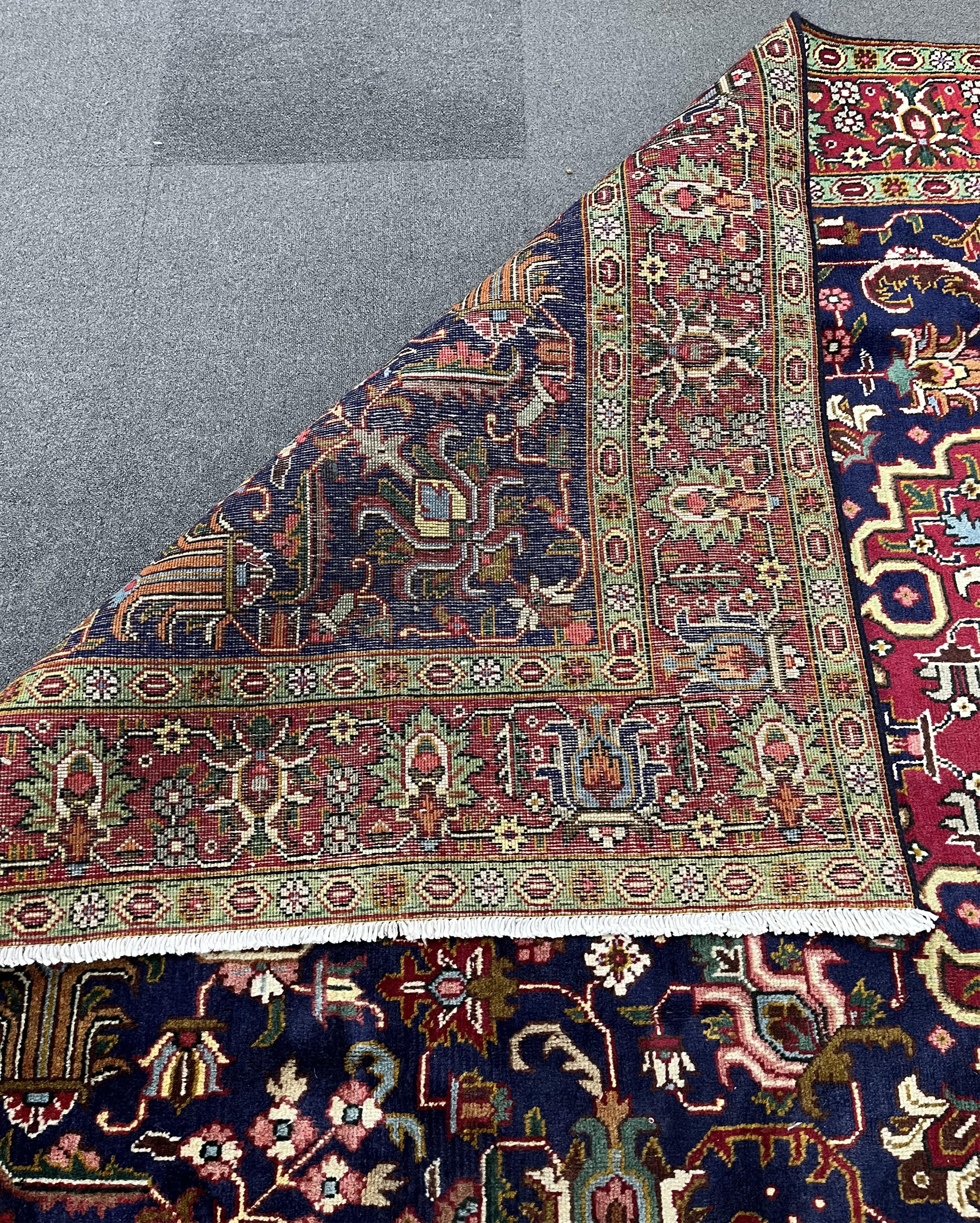 A Tabriz blue ground carpet, 320 x 196cm. Condition - good